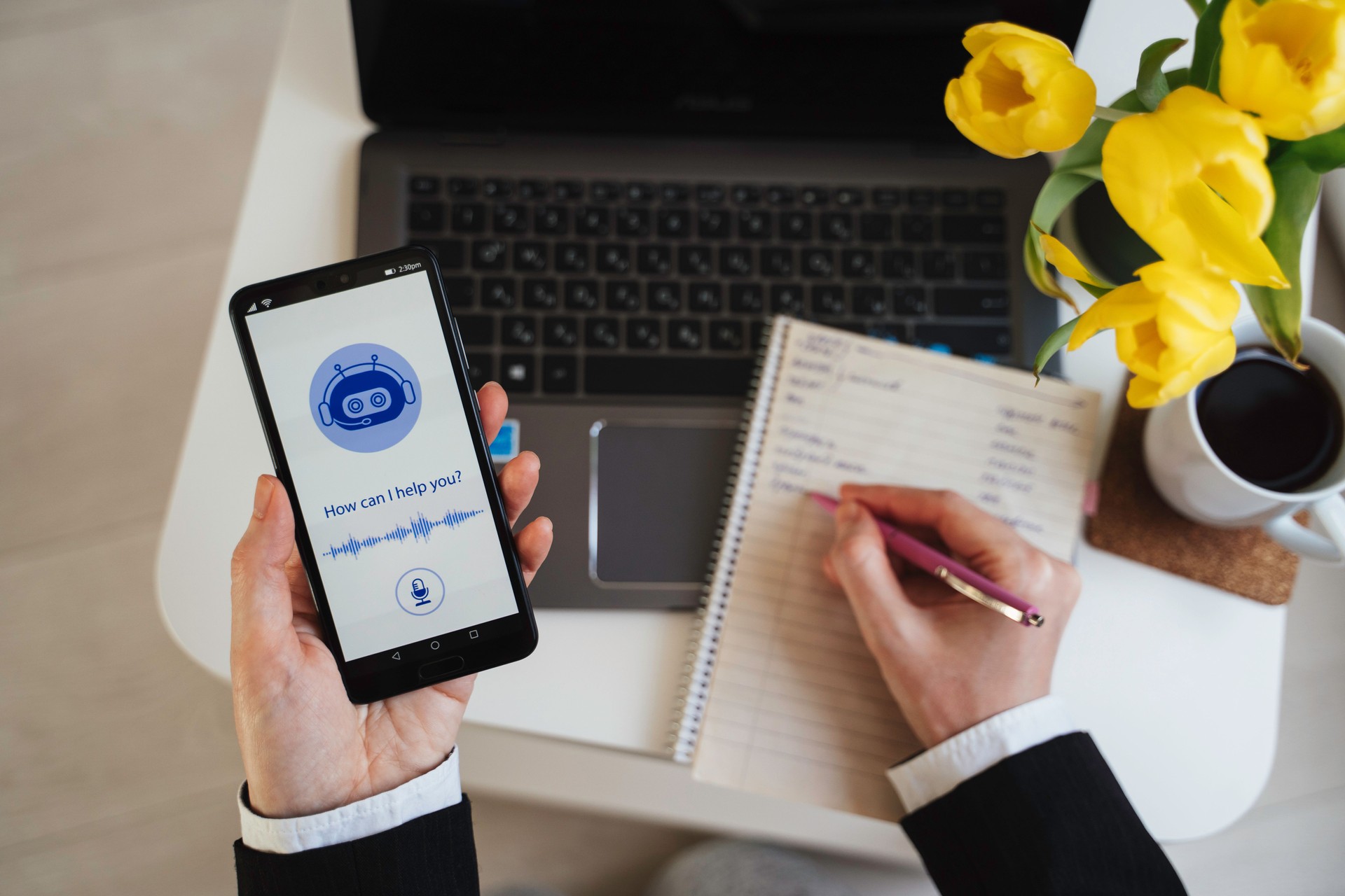 Smartphone displaying AI chatbot with voice assistance